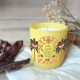 Bougie parfumée 220gr en verre jaune - Le Soleil (Abeille)